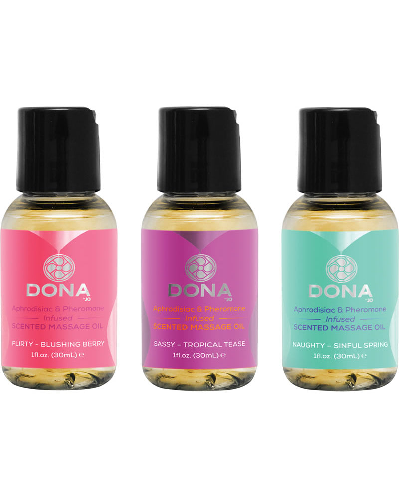 Juego de regalo de aceite de masaje perfumado con feromonas Let Me Touch You de Dona, 3 botellas de 1 onza cada una