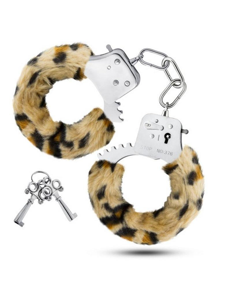 Esposas ajustables de piel sintética Temptasia con llaves y estampado de leopardo